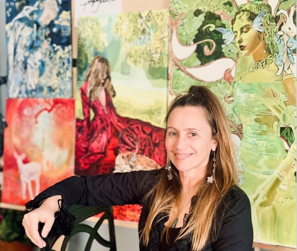 Tanya Johnston Picture woman in front of paintings
